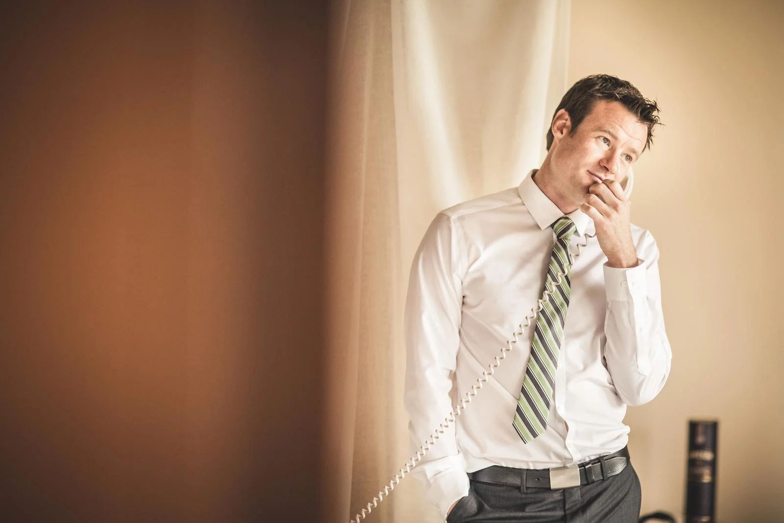 007-wedding-groom-phone-hotel